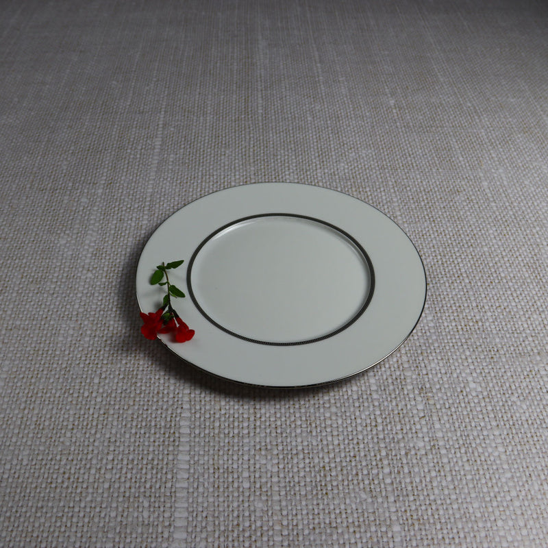 Degrenne plate with rim and red salvia