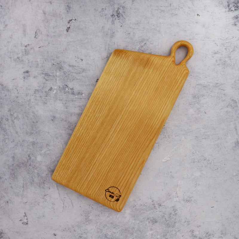 Narrow Ash Cutting Board on Concrate